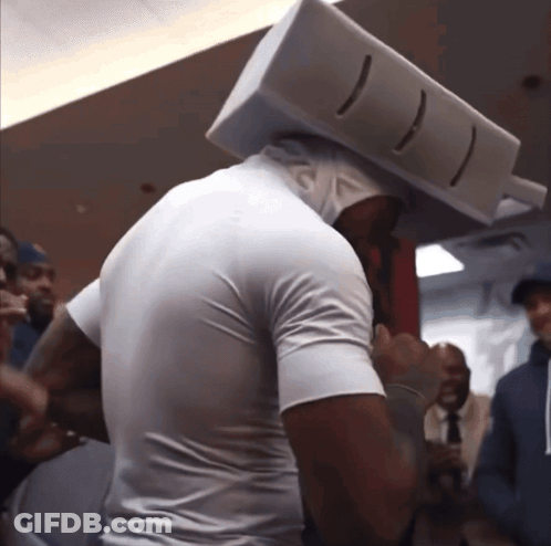 Man In White Shirt With Box On Head GIF