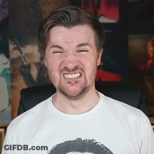 Man In White Shirt With Funny Face Picture GIF
