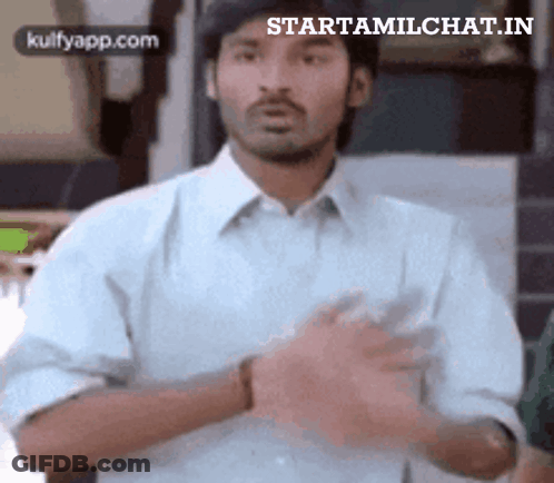 Man In White Shirt With Hands Folded GIF