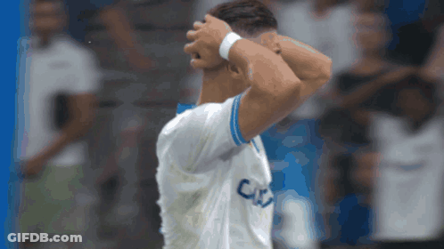Man In White Shirt With Letter C GIF