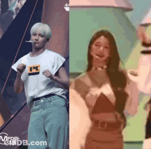 Man In White Shirt With PC Dancing Next To Woman GIF