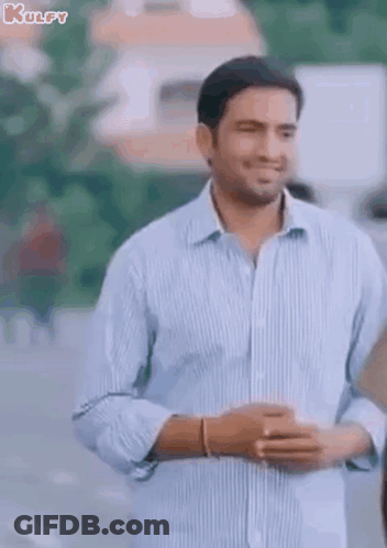 Man In White Shirt With PC Dancing Next To Woman GIF