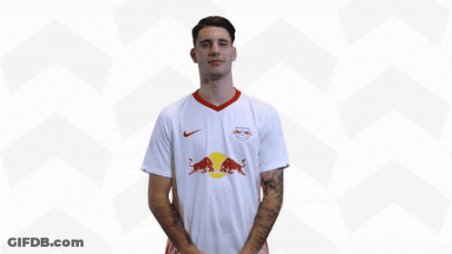 Man In White Shirt With Red Bull GIF