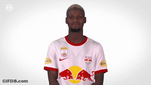 Man In White Shirt With Red Bulls GIF