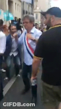 Man In White Shirt With Red White Blue Scarf In Crowd GIF
