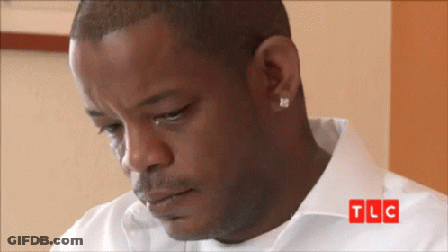Man In White Shirt With TLC Logo GIF