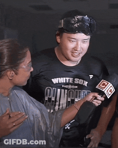 Man In White Sox Shirt Interviewed By Reporter GIF