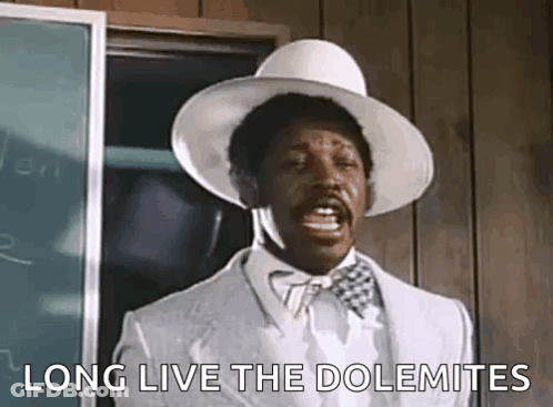 Man In White Suit And Hat Shouting At Blackboard GIF