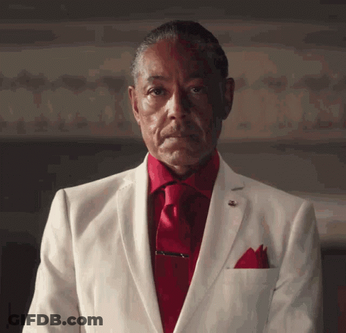 Man In White Suit And Red Tie GIF