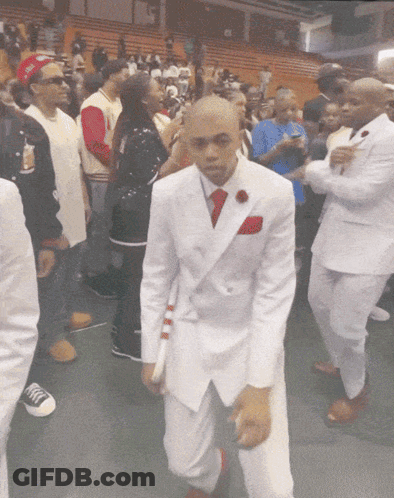 Man In White Suit And Red Tie Dancing GIF