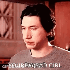 Man In White Suit And Red Tie Next To Man In Red Suit GIF