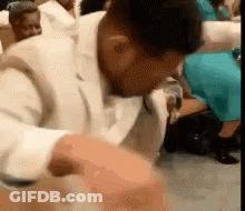 Man In White Suit Dancing In Church GIF