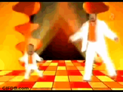 Man In White Suit Dancing On Checkered Floor GIF