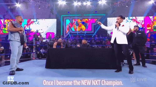 Man In White Suit Holding Trophy GIF