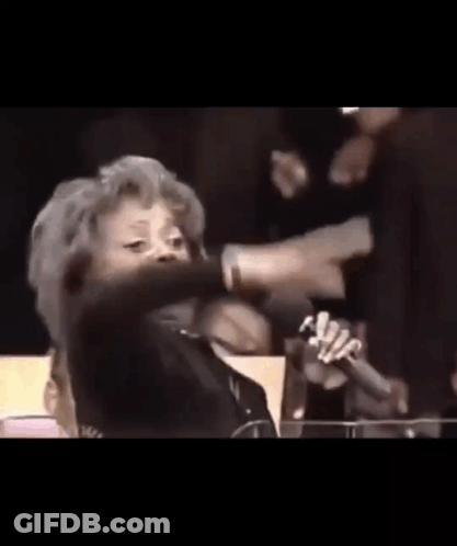 Man In White Suit On Stage GIF