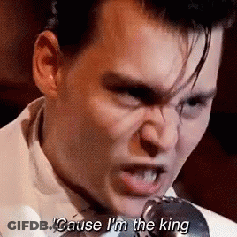 Man In White Suit Singing Into Microphone Saying Cause I'm The King GIF