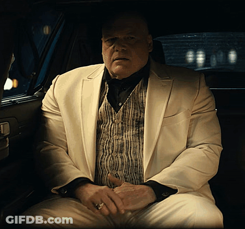 Man In White Suit Sitting In Car GIF