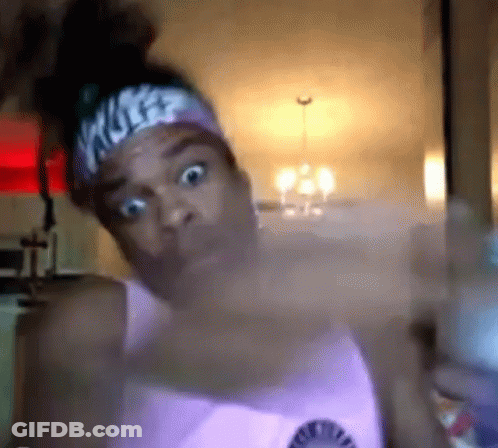 Man In White T-Shirt And Blue Hat Smiling Dancing GIF