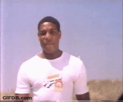Man In White T-Shirt Giving Thumbs Up GIF