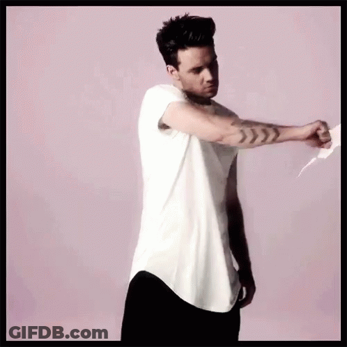 Man In White T-Shirt Holding Paper Saying Down GIF