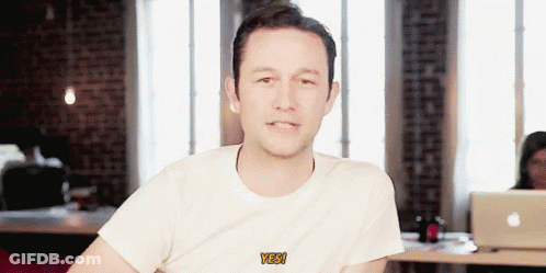 Man In White T-Shirt Saying Yes GIF