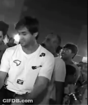 Man In White T-Shirt Standing GIF