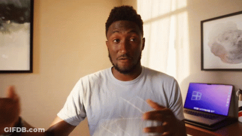 Man In White T-Shirt Using Windows Laptop GIF