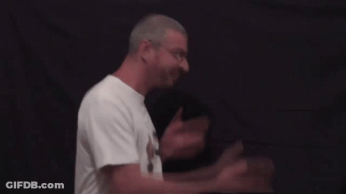 Man In White T-Shirt With Bird GIF