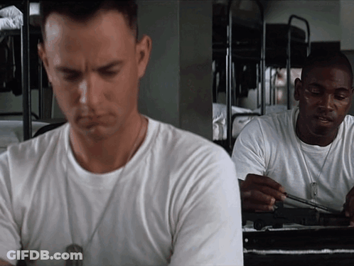 Man In White T-Shirt With Dog Tag GIF
