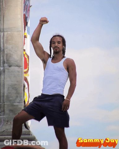 Man In White Tank Top And Black Shorts GIF