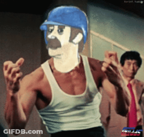 Man In White Tank Top And Blue Baseball Cap GIF