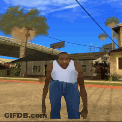Man In White Tank Top And Blue Jeans Standing In Front Of Bridge GIF