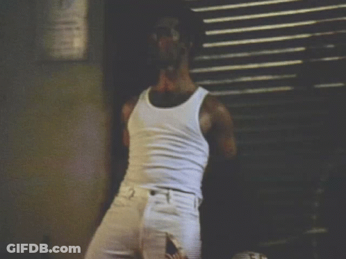 Man In White Tank Top And Shorts GIF