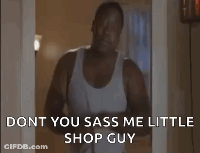 Man In White Tank Top Holding Hair Dryer Talking GIF