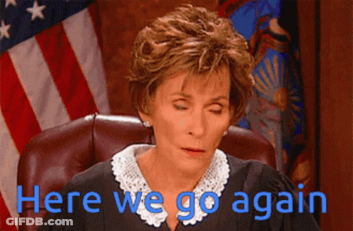 Man In White Tank Top In Front Of Langdon Academy GIF