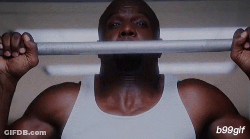 Man In White Tank Top Lifting Bar Over Head GIF