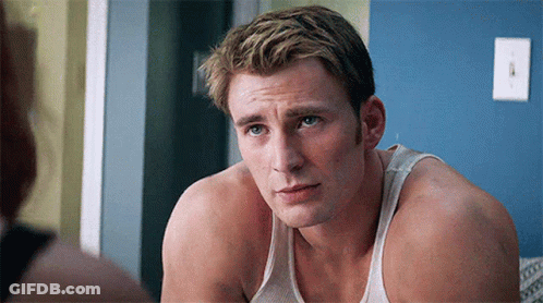 Man In White Tank Top Looking At Woman GIF