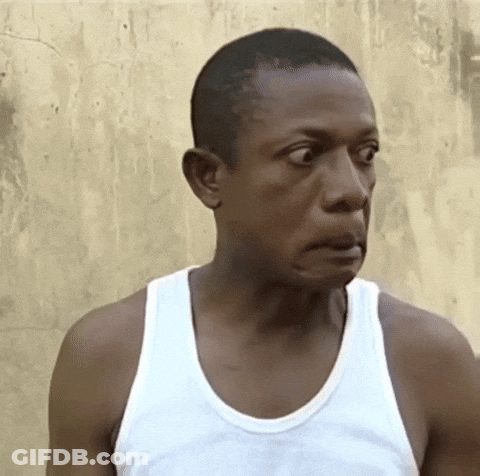 Man In White Tank Top Making Funny Face GIF