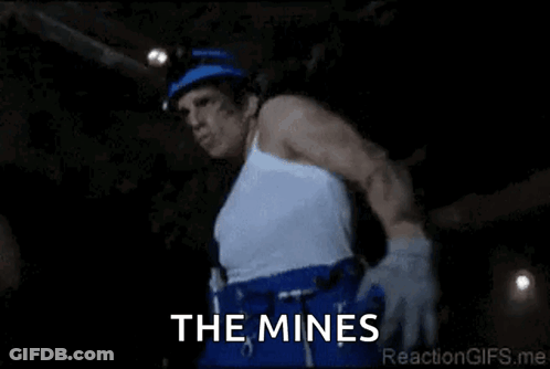 Man In White Tank Top Saying The Mines GIF
