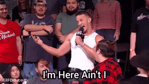 Man In White Tank Top Says I M Here GIF