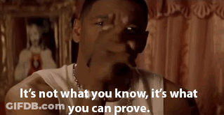 Man In White Tank Top Says It's Not What You Know It's What You Can Prove GIF