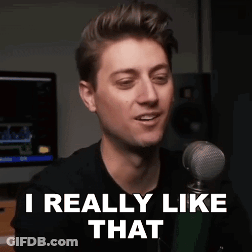 Man In White Tank Top Sitting On Couch GIF