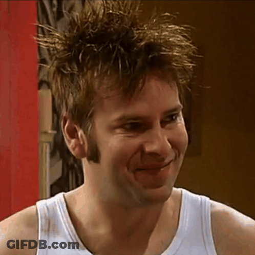 Man In White Tank Top Smiling GIF
