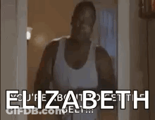 Man In White Tank Top Standing In Doorway Saying Elizabeth GIF
