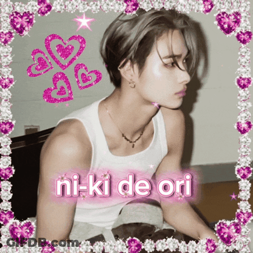 Man In White Tank Top Surrounded By Pink Hearts Says Ni-Ki De Ori GIF