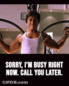 Man In White Tank Top Using Machine Says Sorry Busy Call You Later GIF