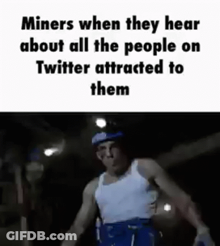 Man In White Tank Top Walking In Dark GIF