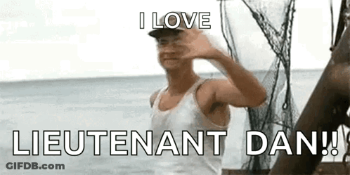 Man In White Tank Top Waving From Boat GIF