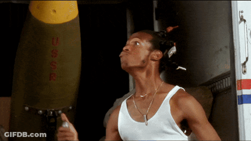 Man In White Tank Top With USSR Bomb GIF