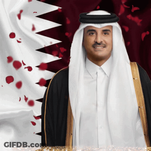 Man In White Turban Black Coat Qatar Flag GIF